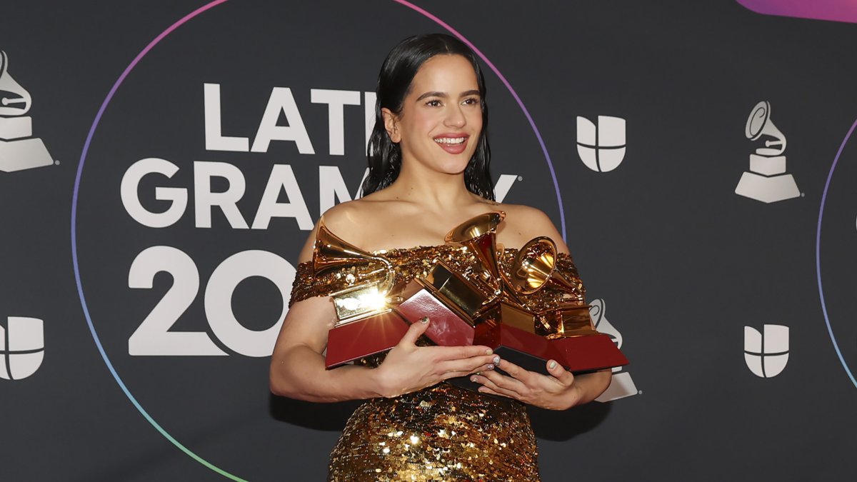 Rosalia poses with four of the eight Latin Grammy Awards she won – including for Album of the Year, Song of the Year and Record of the Year – in the media center at the 23rd Annual Latin Grammy Awards held at the Michelob Ultra Arena on November 17, 2022 in Las Vegas, Nevada.